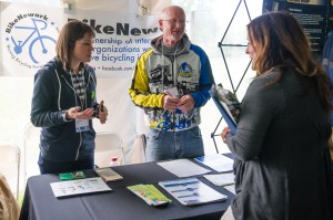 BikeNewark members Caitlynn Coster and Mark Deshon talk to participants at 2017 Walkable Bikeable Delaware Summit
