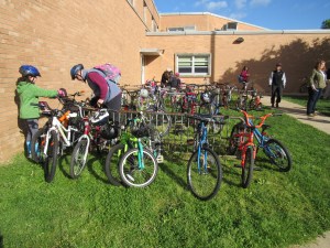 photo of students arriving by bike at John R. Downes Elementary School
