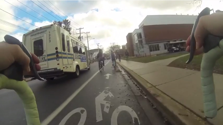 photo of dangers of current contraflow (i.e., illegal) bicycling on Delaware Ave.