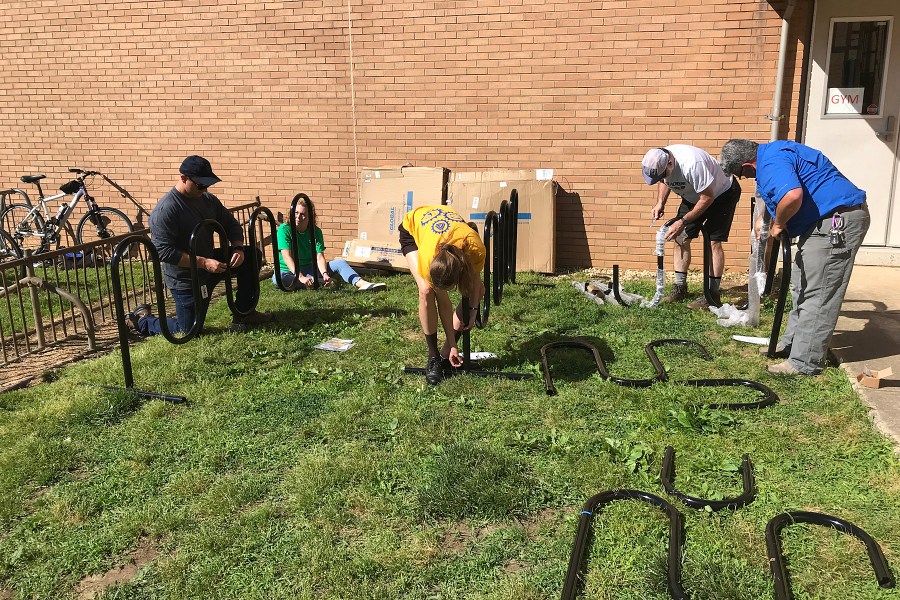 photo of volunteers assembling bike racks