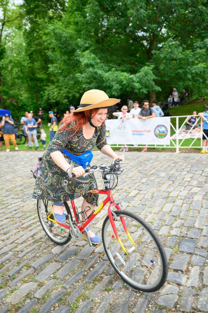 photo of Jacquee Lukawski biking up Monkey Hill cobbletones